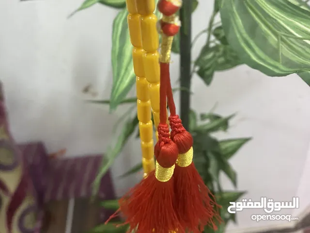 سبحة رجالي كهرب ترابي ام الكركوشتين والخيط الاحمر