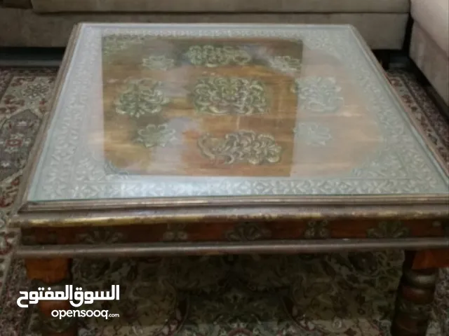 طاولة مصنوعة من الخشب والنحاس الفاخر Luxurious wood and brass table