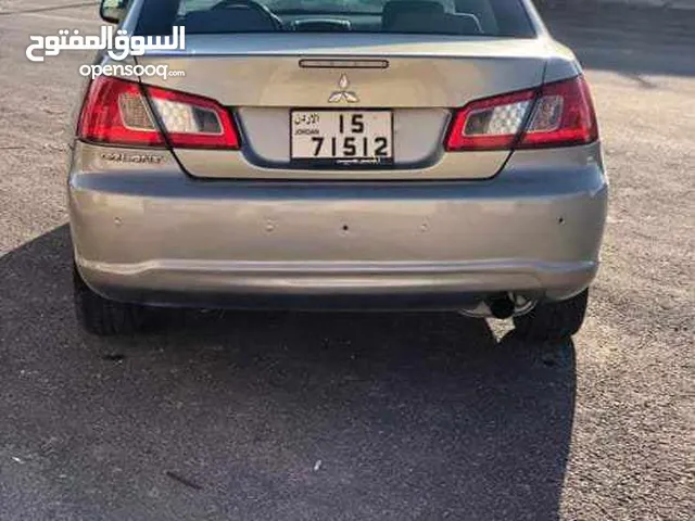 ميتسوبيشي جالنت موديل 2009 للبيع فحص كامل مرخصه لشهر واحد اللون شمباني الموقع الكرك العدنانيه