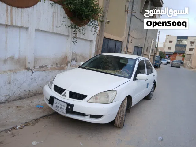 ميتشي لانسر 2010 سياره الدار تبارك الرحمن محرك 13 100 100 كمبيو 100 100 صاله 100%