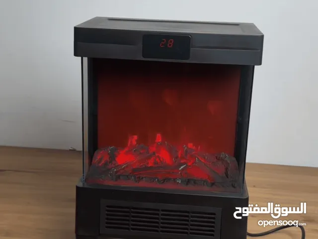 مدفأة بمنظر حطب