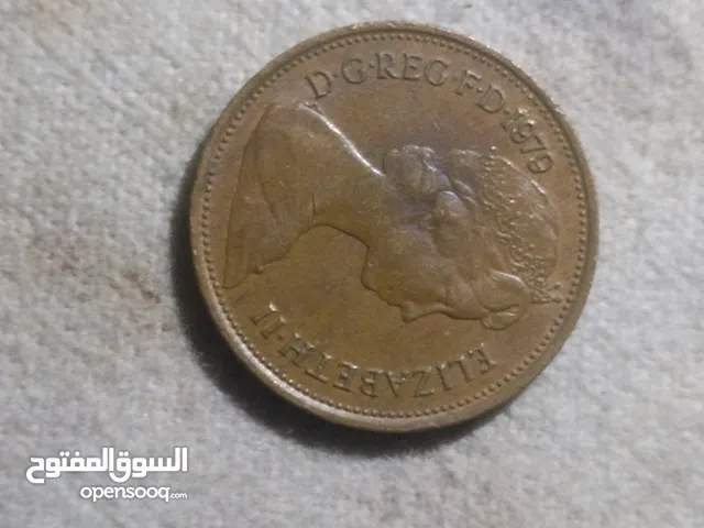 عملة معدنية بريطانية من فئة 2 بنس (2p) [1، 4].