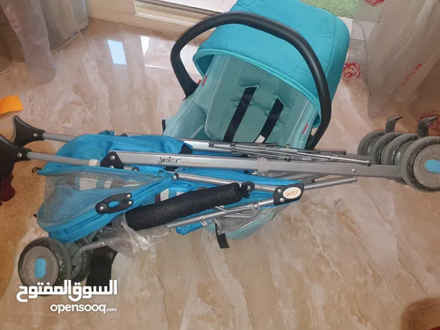 للبيع عربه خفيفه الوزن قابله للطي ماركه جونيور+كرسي طعام