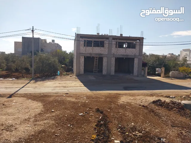 مستودع للاجار في حواره اربد (طابقين) بالقرب شارع البتراء وحيفا بغداد - يصلح لاعمال تخزين البضائع