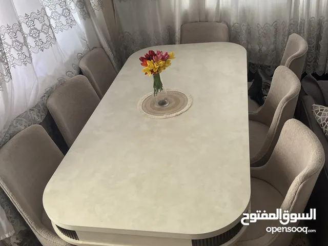طاولة سفرة 8 كراسي تنجيد فخم وراقي