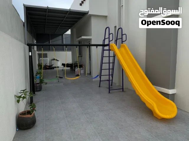 ارجوحة مع زحليقة الجميلة في موسم السعادة للالعاب الداخلية والخارجية ومستلزمات الحضانات والمدارس