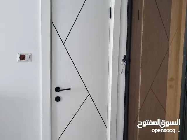 ابو رموز للابواب البلومير