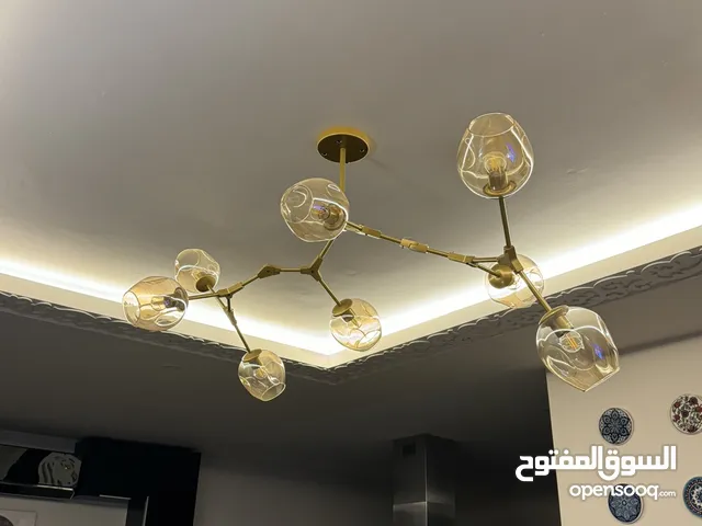 ثريا مودرن ذهبية بثمان رؤوس زجاج – من محل MECASA Khalda
