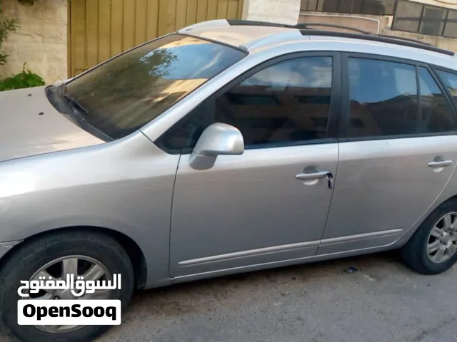 2007 كيا كارينز Standard