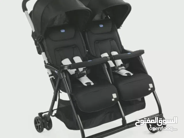 عربة اطفال مزدوجة