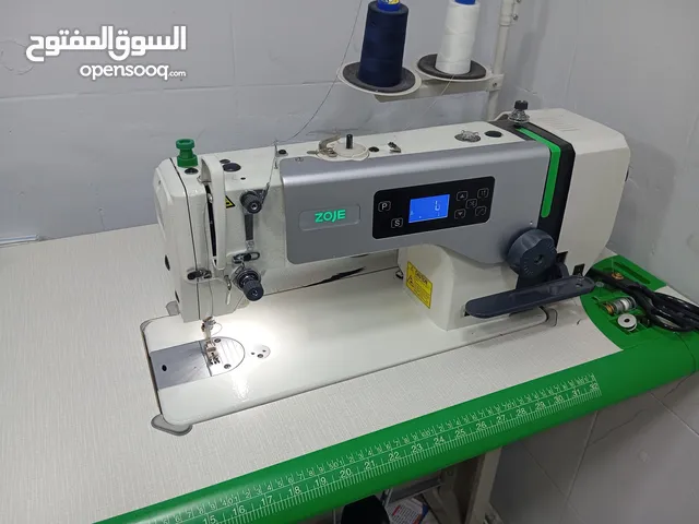 مكنة خياطة وأوفر للبيع ماركة زوجي