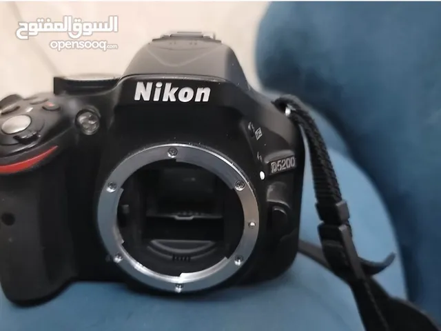 كاميرا نيكون D5200 مع عدستين(18-55)mm  و (55-200)mm