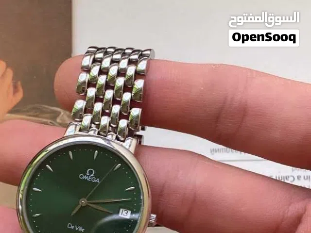 Omega de ville , green dial