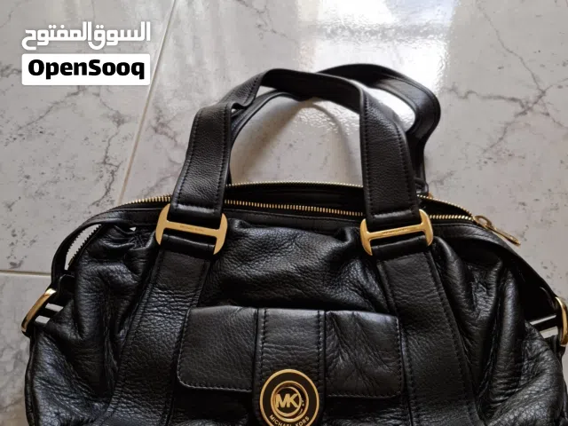 مايكل كورس،بيير كاردان،فوسيل