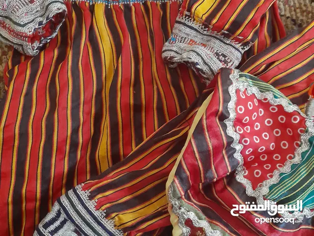 ثوب عماني خياطه ايد