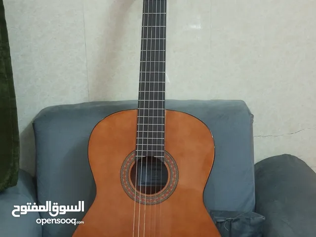 جيتار ياماها c45 مع اوتار وكامبو جديد نوع كلاسيك مناسب للمبتدئين بالعزف سهل التعلم