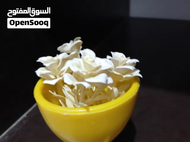 دمية لصفراء للتزين بيت مستعملة باهية و محلاه