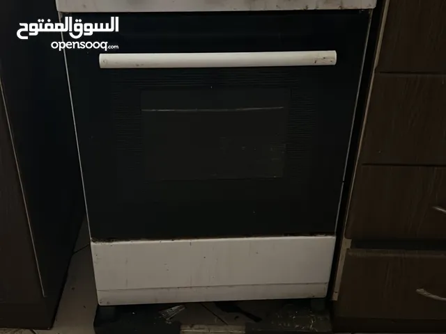 Cooking range and wooden stand