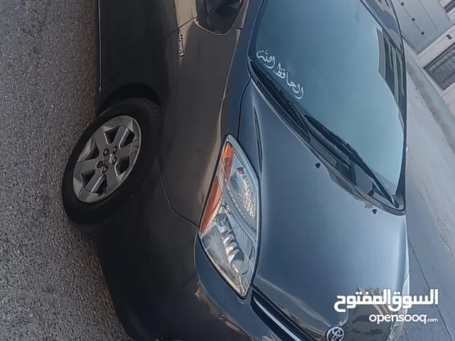 تويوتا بريوس لون فيراني موديل 2009 فل كامل فل سمارت للبيع