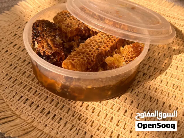 عسل العتم الجبلي بالشمع تربية
