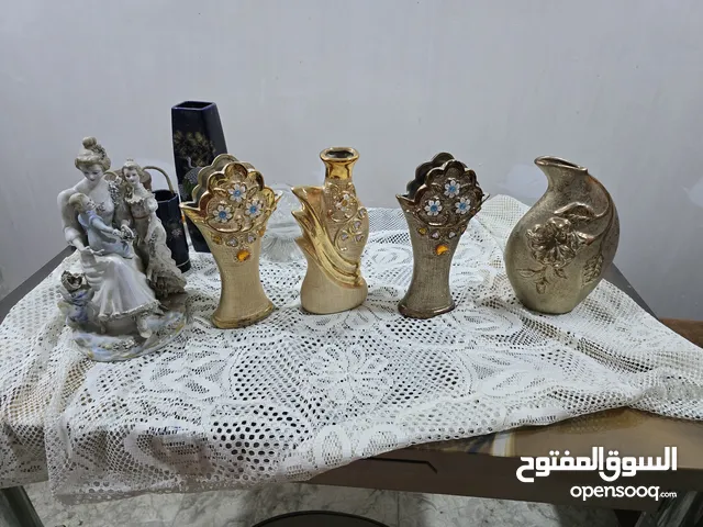 مزهريات عدد 4 مع تمثال للبيع