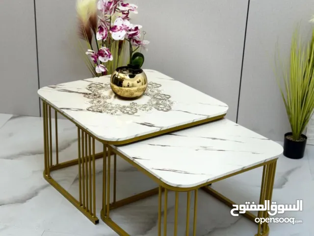 طاولات مودرن بتصميم عصري يخطف الأنظار باشكال متعدةة دائري ومربع سطح رخام فاخر ولمعة جذابة مع قاعدة