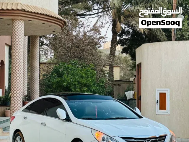 سوناتا 2012صالون بيج نفس المحلي ولون ابيض وفل مسكر ومحرك العادي واصلية