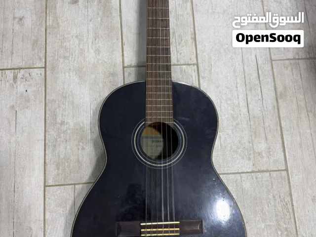 guitar with a bag - قيتار مع الشنطة للبيع
