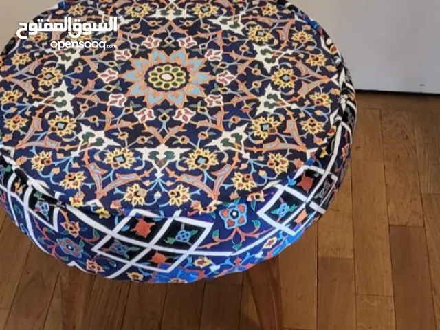 Traditional Red Footstool with Wooden Legs and Velvet Fabric