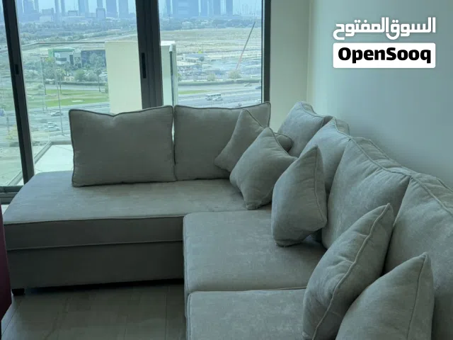 New Light grey L-shaped fabric corner sofa — good condition 300 x 200 cm - 2300aed negotiable