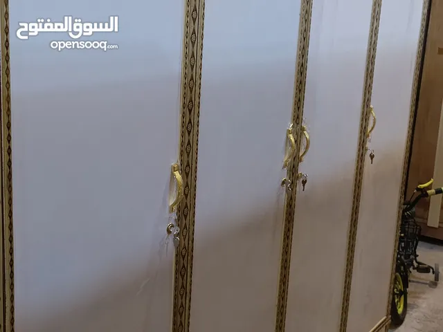 كناتير 4 باب شغل عراقي لون ابيض اقره الوصف
