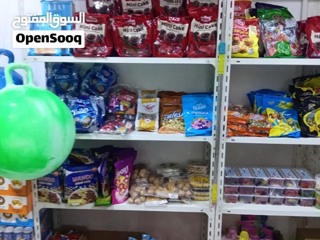رفوف محل للبيع