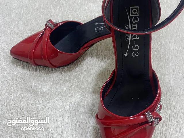 Red With Heels in Basra