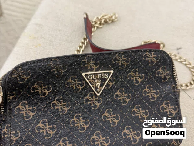 brown GUESS for sale  in Muscat