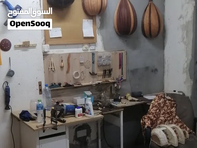 ورشه صناعه العود وتصليح الاعواد