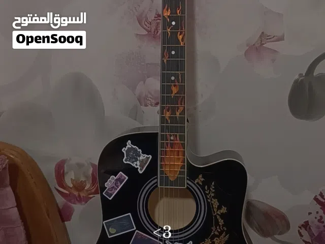 جيتار جديد غير مستعمل نظيف و مزين بالملصقات