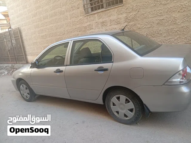 2013 ميتسوبيشي لانسر Standard