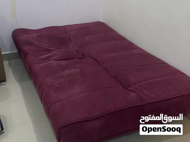كنب يتحول لسرير (نفر ونص) لون عنابى للبيع