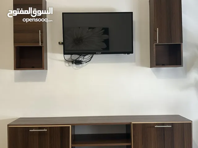 خزانة تلفزيون متعدد الإستخدامات باللون البني