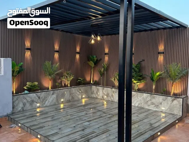 تركيب مظلات وتنسيق حدائق وشلالات والعشب الصناعي
