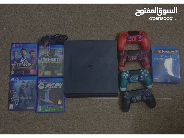 ps4 slim with cds and 4 controllers