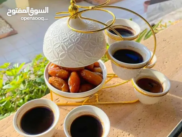 فناجيل. قهوه.سرميك مع تماره سرميك مع. شيل. ذهبي. علئ شكل هلال