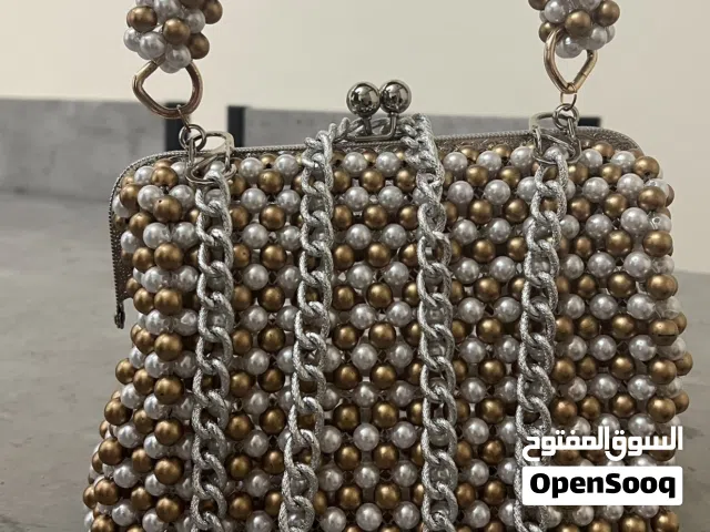 حقائب نسائية يدوية الصنع