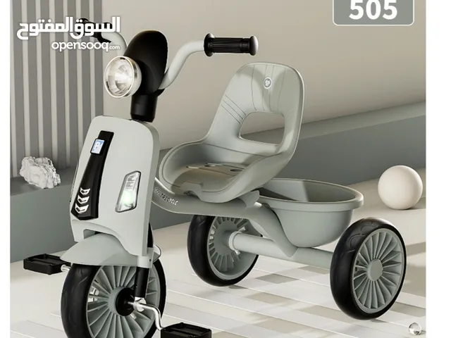 دراجة ثلاثية العجلات للأطفال بتصميم روبوتي أخضر مع سلة خلفية
