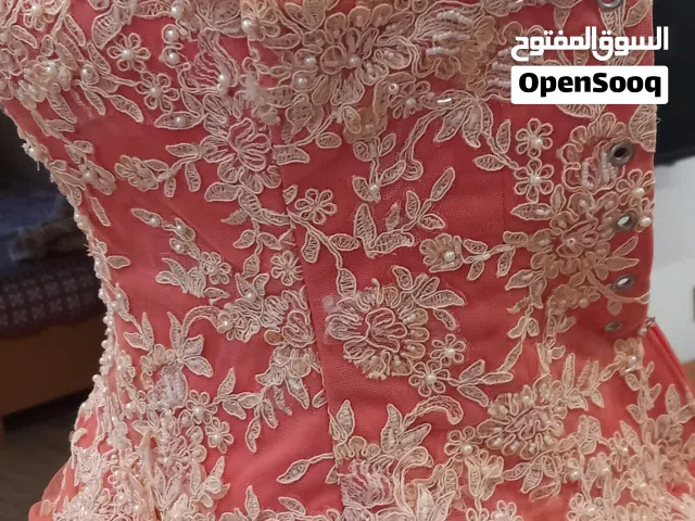 فستان خطوبة باربي لون برتقالي وردي للبيع