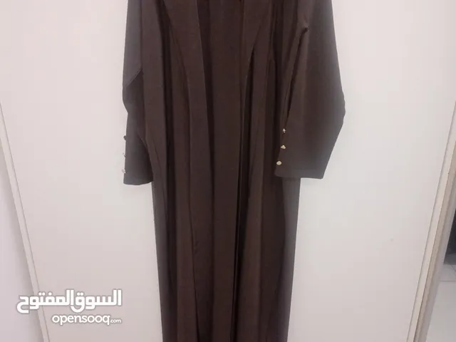 dresses ,tops, abayas, Versace tracksuit