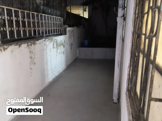 2غرف وصالون وحمامين ومطبخ وجنينة كبيرة طابق ارضي