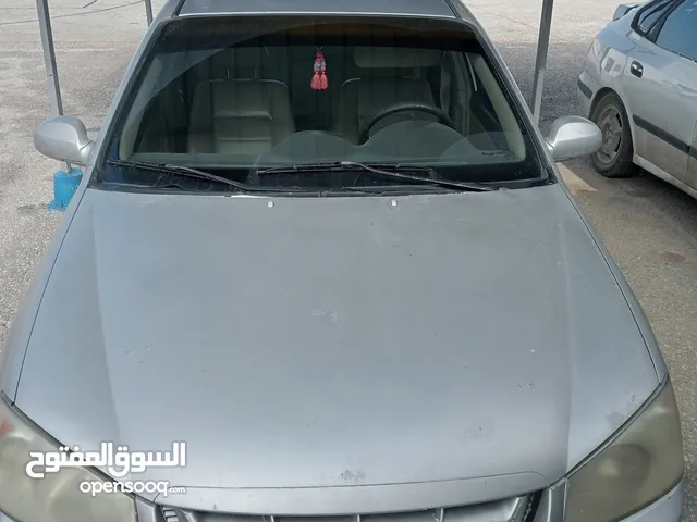 كيا سيراتو اتومايك بحالة جيدة موديل 2004 ،سيارة نظيفة وعملية بحاجة لصيانة خفيفية