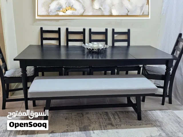Extendable dining table+8 chair +bench IKEA like new