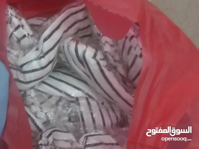 تصقيه محل شروة تي شيرت مقلم عدد 200 ومشكل عدد 60 + قميص نص كم عدد 50